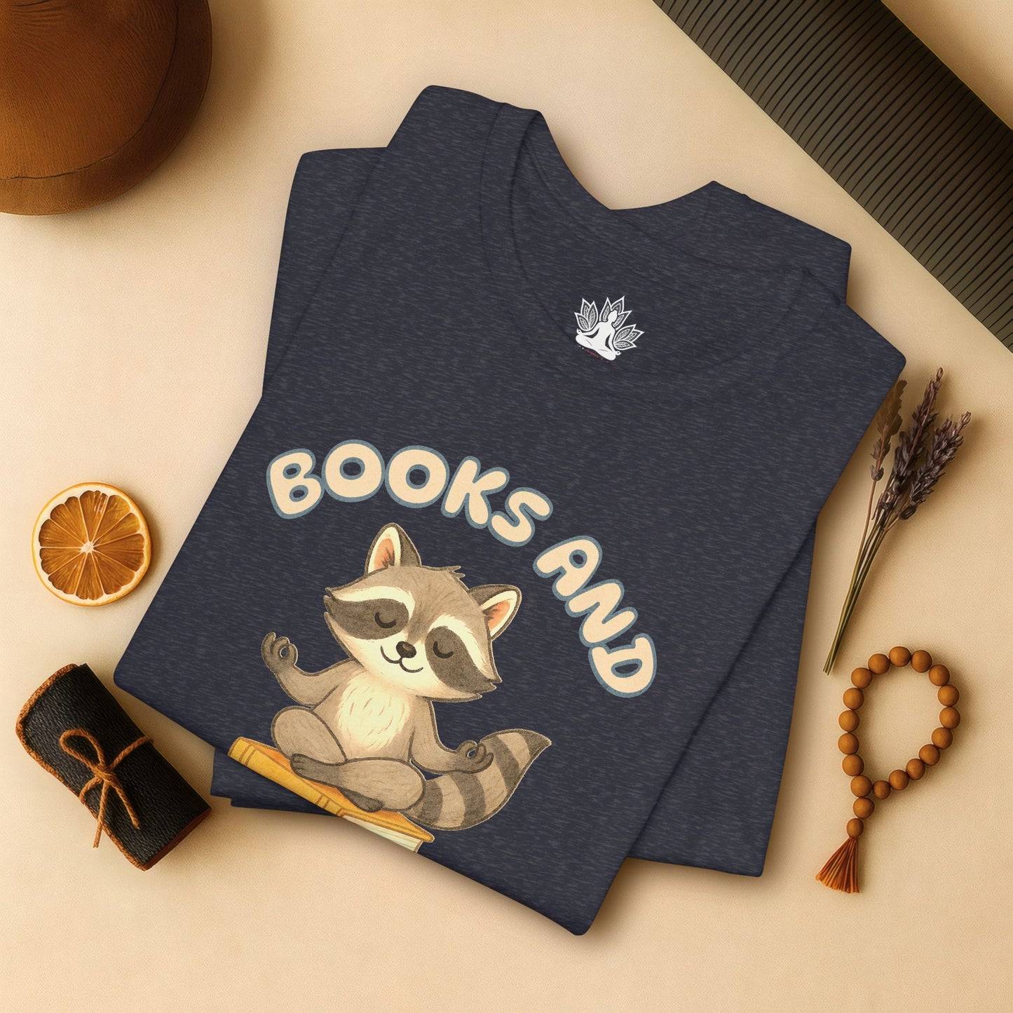 Books and Yoga – Cozy Raccoon Tee