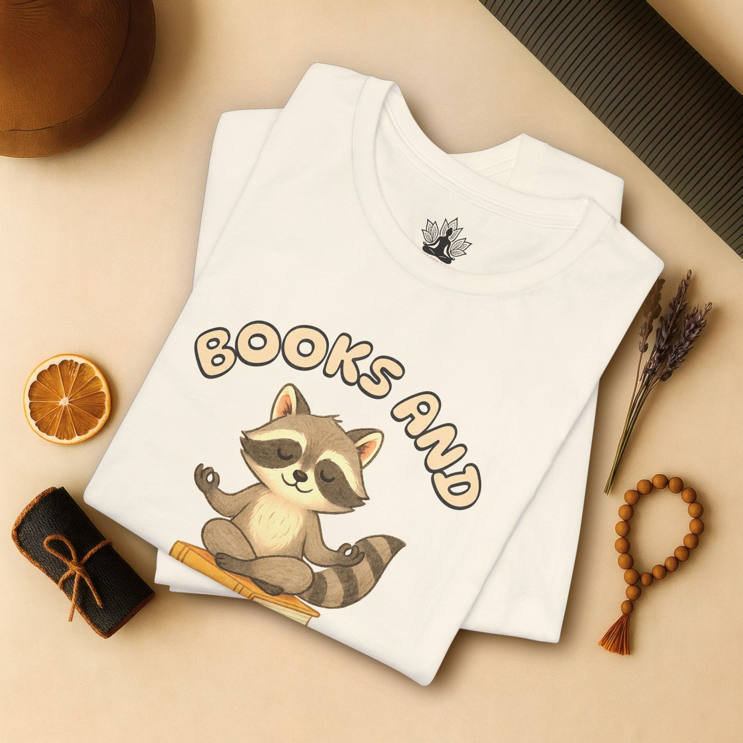 Books and Yoga – Cozy Raccoon Tee