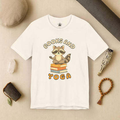 Books and Yoga – Cozy Raccoon Tee